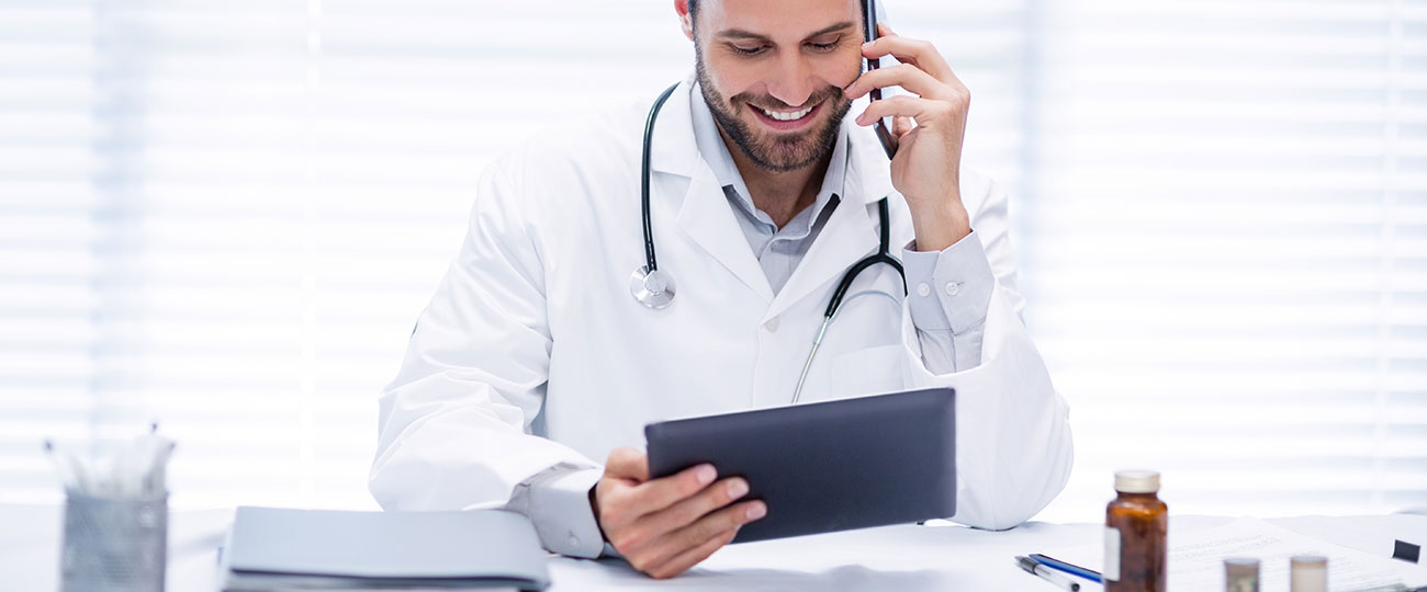 Medical Billing Experts in New York. Telehealth billing services. Doctor on phone call.